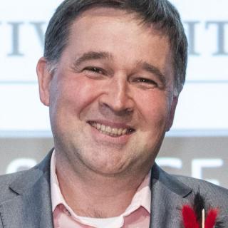 Christopher Jaroniec presenting at an event